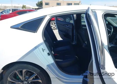 2020 Honda Civic Sport z USA, uszkodzony, nr VIN 19XFC2F8XLE216119